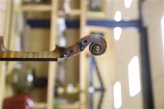 A late 19th century German violin, bears Stradivarius label, cased with bow, back 36cm